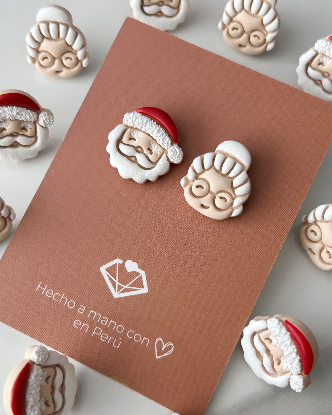 Studs Mr. y Mrs. Claus